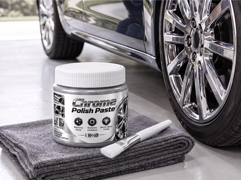 Polishing paste with brush and towel beside a wheel