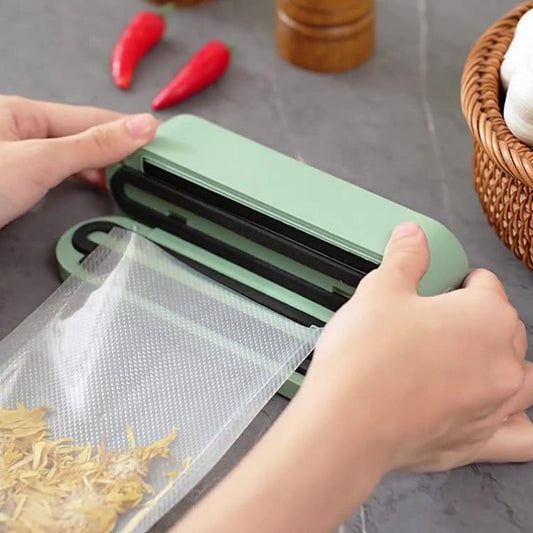 🎁Hot sale 49% OFF💥Portable Handheld Vacuum Food Preservation Packaging and Laminating Machine🍃